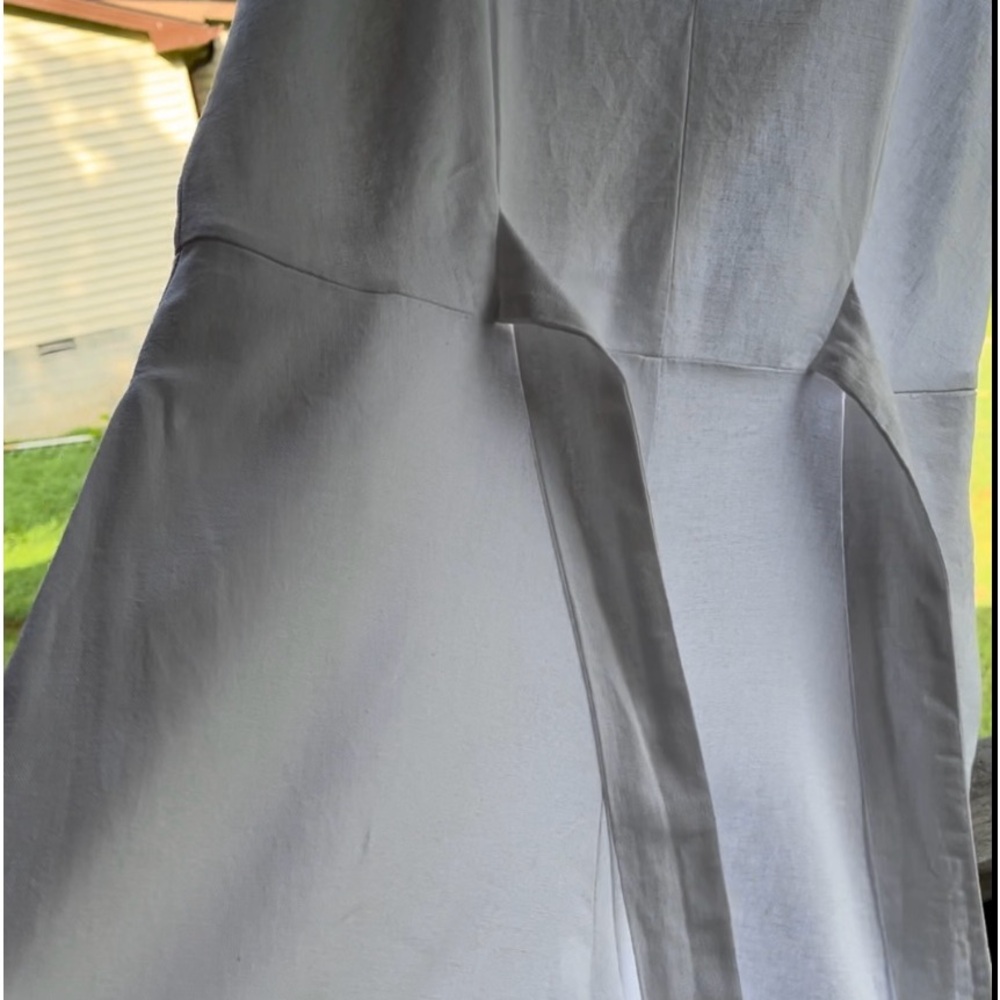 White linen jumpsuit with tulip cut legs